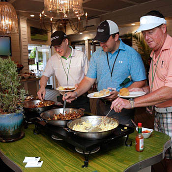 Guests line up for breakfast served at the Fairway Buffet