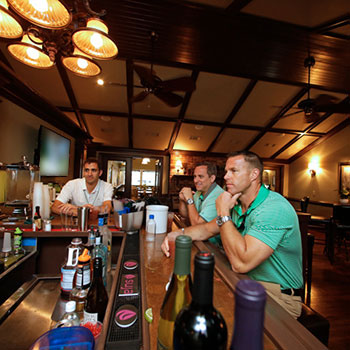 Members having a drink in the Sand Trap Lounge